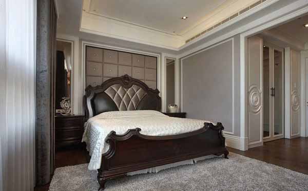 欧式 三居 卧室图片来自上海潮心装潢设计有限公司在诸新三村115平欧式三室装修设计的分享