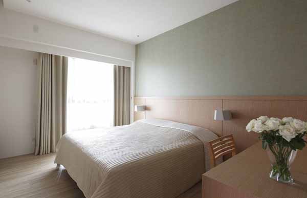 简约 三居 卧室图片来自上海潮心装潢设计有限公司在116平装修简约设计增添空间表情的分享