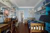 ▲ 蓝色调儿童房，墙面空间最大限度利用