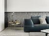 长景国际设计在沙发背墙的表现上，采用三种不同的石材搭配灯光设计，演绎空间的层次感及变化。
