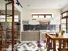 林和昌设计师依循屋主实际需求，重新砌出一个开放式厨房，透过现代感厨具与六角地砖的铺设，勾勒居者的生活样貌。