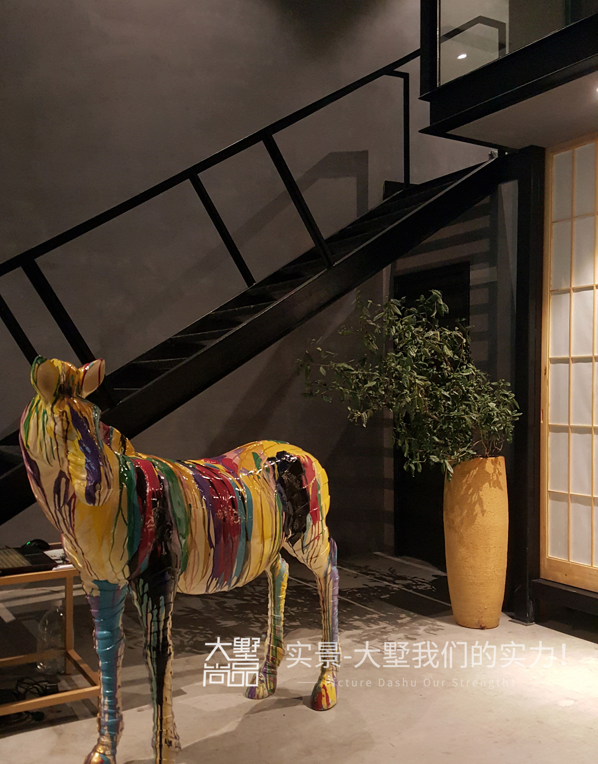 客厅图片来自大墅尚品-由伟壮设计在禅意美术馆·茶言遇树的分享