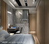 考虑私人空间的使用尺度，主卧房以矮墙的形式连结睡眠区与盥洗区，并使用玻璃、石材与木皮烘托出卧眠的温度。