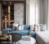 以灰色和蓝色为配色主题，于家具与软件上展现跳色效果，替空间增添一抹视觉亮点。
