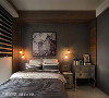 简练的灰色调搭配木质元素，为卧室空间添色加温，形塑温暖舒适的情境。