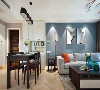 餐厅与客厅互通，整体空间采用色块与功能性家具划分场域