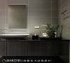 卫浴空间以大地暗色洗练的设计，让人走入其中能沉淀心情，创造舒适的洗浴体验。