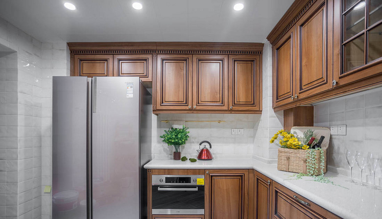 厨房图片来自家装大管家在120平美式舒适3居 都市慢生活的分享