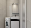 墙砖采用灰色调的，白色马桶和浴室柜用黑色点缀，简洁，大气