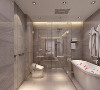 卫生间采用一种超现代的思考方式、灰色墙地一体瓷砖、白色卫浴、更 是把洗衣机用柜体隐藏，整体表现时尚之气。