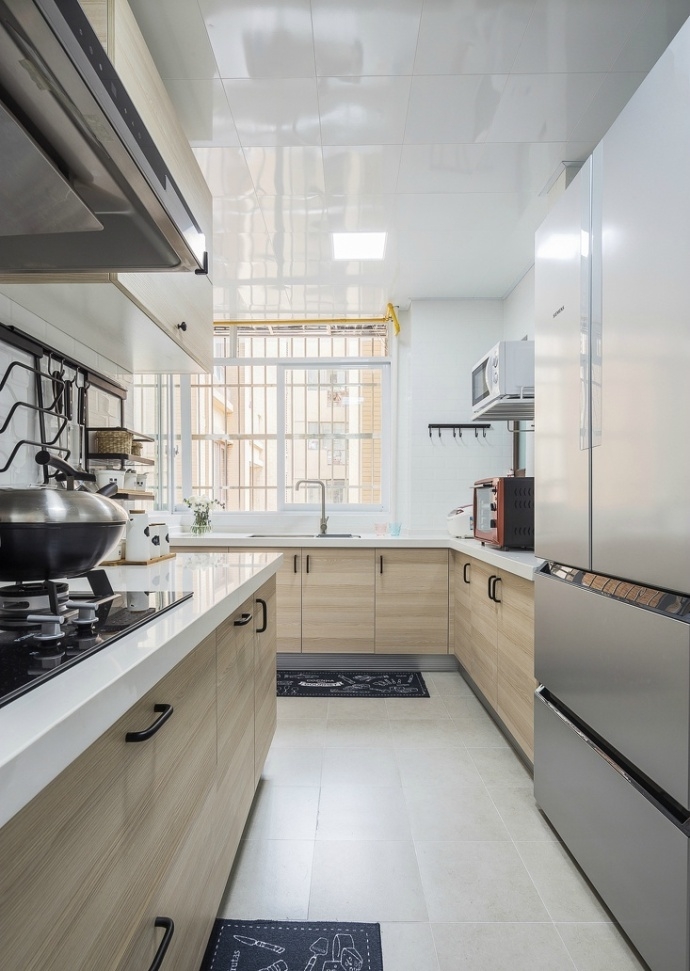 厨房图片来自西安紫苹果装饰工程有限公司在98平米现代简约的分享
