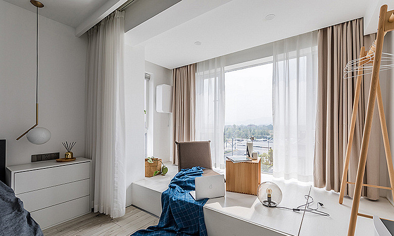 卧室图片来自家装大管家在100平现代时尚空间 不失活力雅致的分享