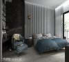 主卧房
京彩设计利用灰色绷布打造床头主墙，规则的线条搭配一旁大理石花纹，调和出饭店般的精致质感。