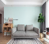客厅的背景墙采用大面积的薄荷绿搭配原木色的家具和点点绿植整个空间清新淡雅。细密质感的麻布沙发透露出一股朴素清新之美。