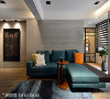 客厅设计
沙发背墙以水泥粉光为底，透过手刮的方式呈现独特肌理；家具的配色上，则在低调简约的色彩基调下，选搭一组抢眼的湖水蓝沙发，让空间跳脱出鲜明个性。
