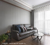 沙发背墙
沙发背墙以特殊涂料为铺叙，辅以俐落线条刻划细节，现代设计语汇添划空间风尚质感。