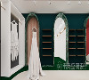拱形门后分别为中式婚纱及妈妈服饰区和仓库区域，墨绿独有的优雅气质，结合着墙面留白彰显出卓尔不凡的独特魅力。