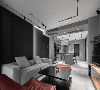 整屋的风格以简约为主，黑白灰成为居室空间的主色调。客厅区域选择了无主灯设计，使用线条感强的磁吸灯＋线性灯带的照明方式，让光线分布更均匀。同时磁吸灯由多种灯头组成，具有多变性，可以带来不一样的视觉感受。